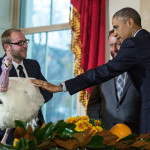 President Barack Obama, National Turkey Federation Chairman Gary Cooper; and son Cole Cooper participate in the annual National Thanksgiving Turkey pardon ceremony in the Grand Foyer of the White House, Nov. 26, 2014. (Official White House Photo by Pete Souza)